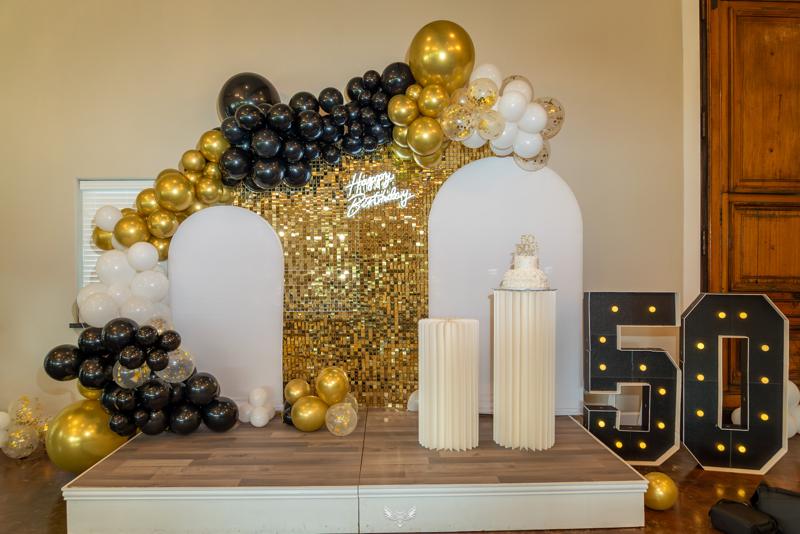 Gold and black 50th birthday celebration decor