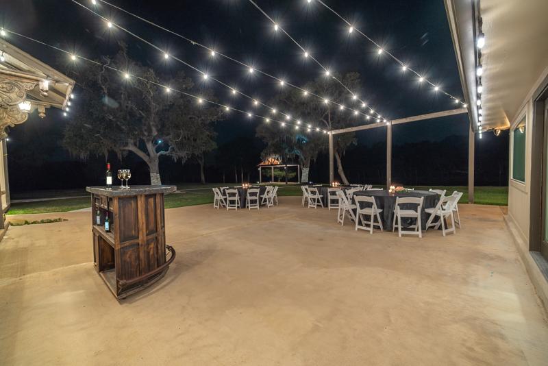 Patio under string lights at night